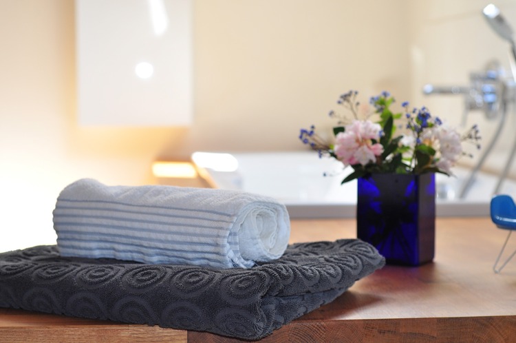bath and hand towels folded up